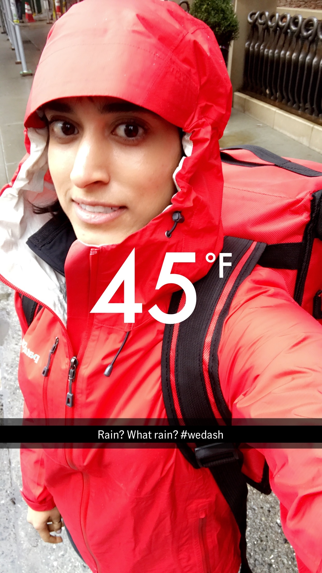 Darshini doing deliveries in the rain